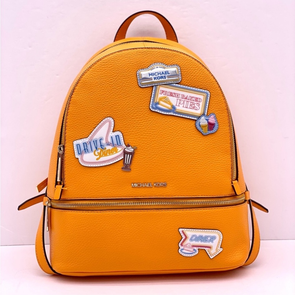 Michael Kors Vibrant Orange Backpack with Fun Patches